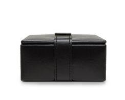 Heritage 4 Piece Cufflink Box in smooth black plant-based materials, shown closed from a straight front view displaying its compact square shape and a vertical closure strap with a silver metal tab.