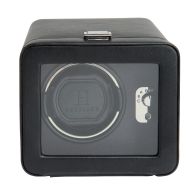 Windsor Single Watch Winder shown from a straight front view, featuring a closed square door with a large glass viewing window framed in textured black material, revealing a single watch cuff inside