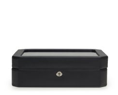 Front profile view of the closed black Windsor 10 Piece Watch Box, showcasing its distinct octagonal beveled corners, clean black stitching, and a polished silver key-lock mechanism.