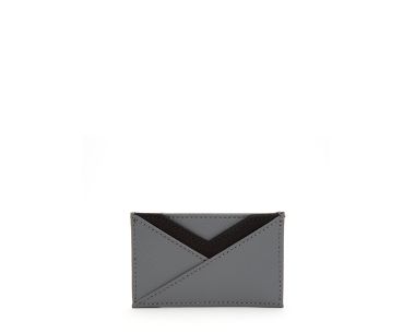 Howard Card Wallet in grey material, straight-on front view showing a slim rectangular card holder with a geometric V-shaped pocket design.