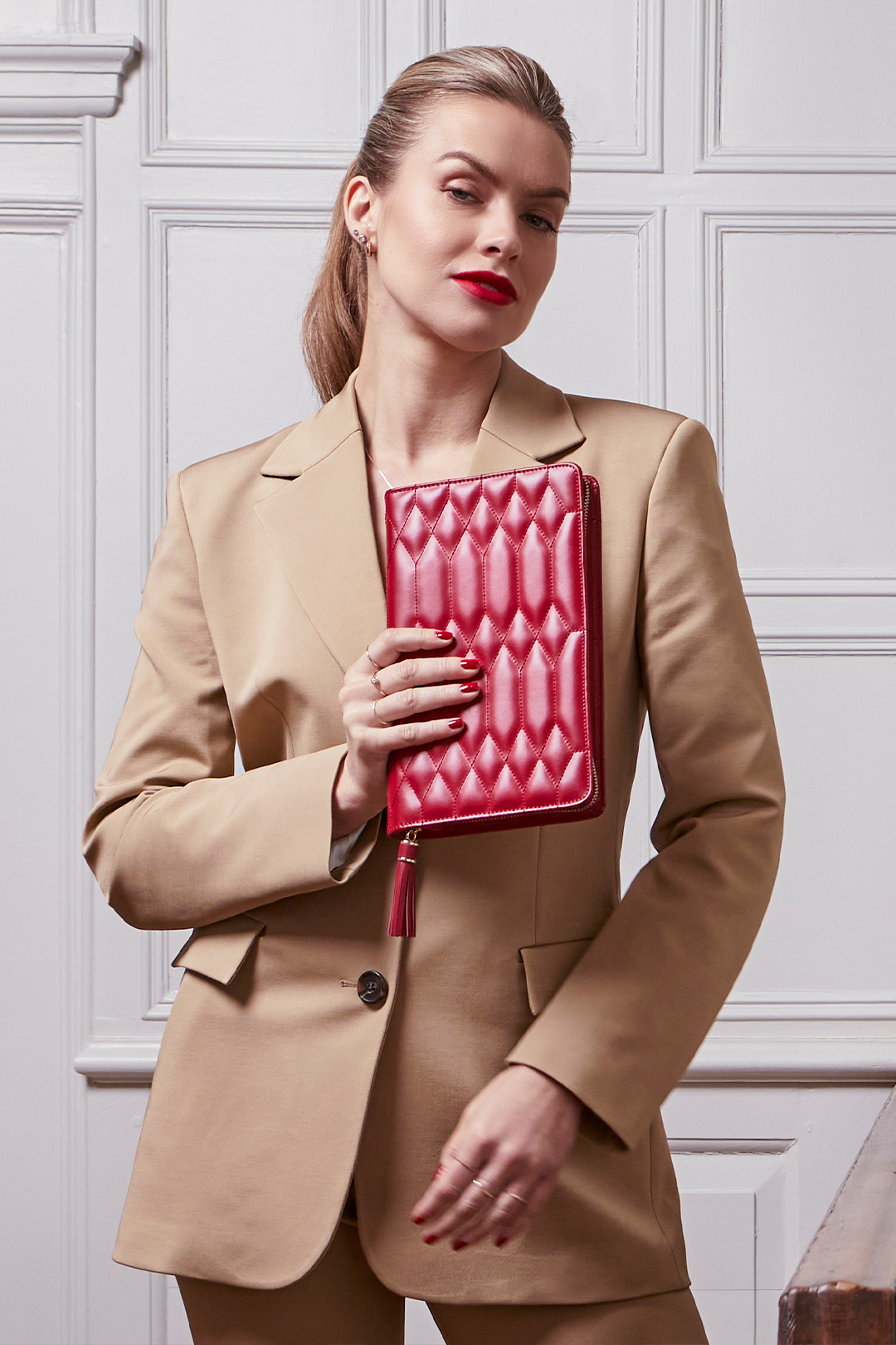 model holding Caroline jewelry portfolio model holding Caroline jewelry portfolio