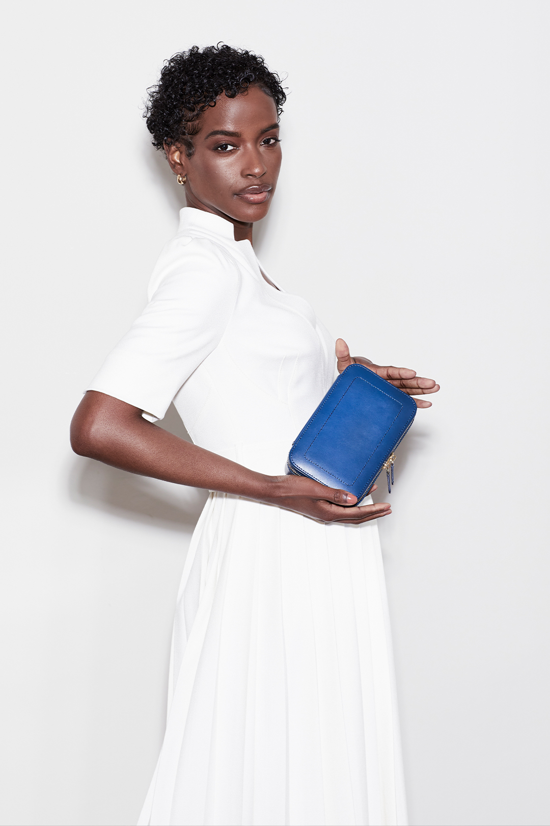 Model holding sophia jewellery zip case Model holding sophia jewellery zip case