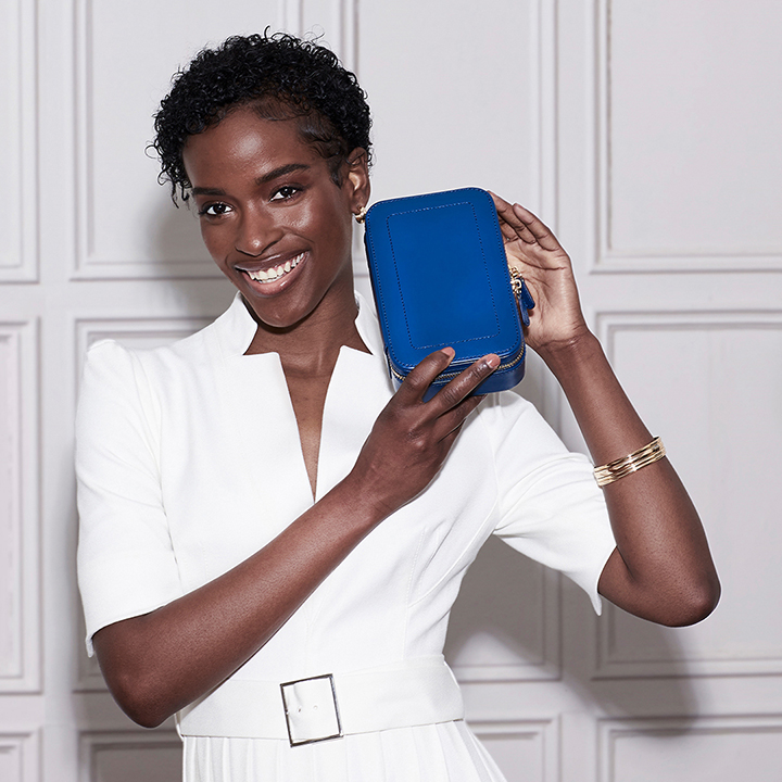 model holding sophia jewellery zip case model holding sophia jewellery zip case