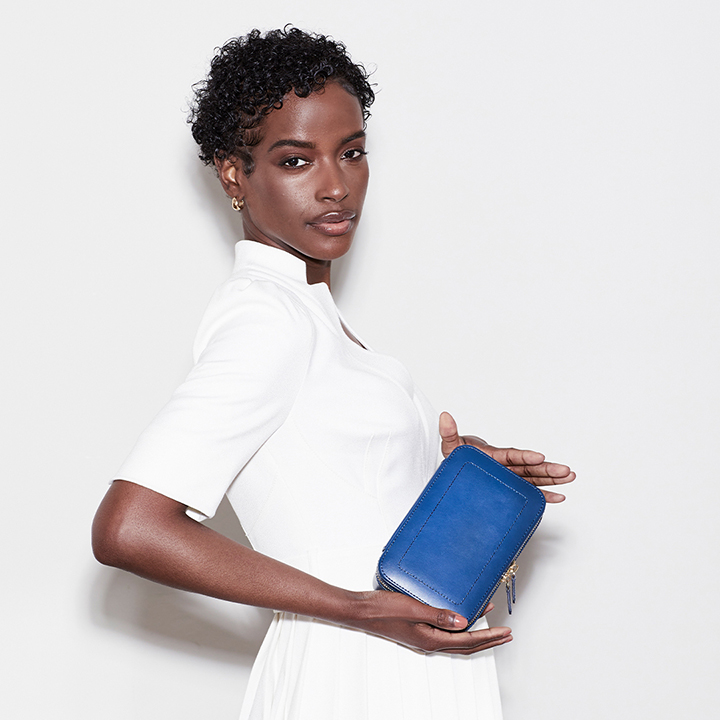 model holding Maria jewellery zip case model holding Maria jewellery zip case