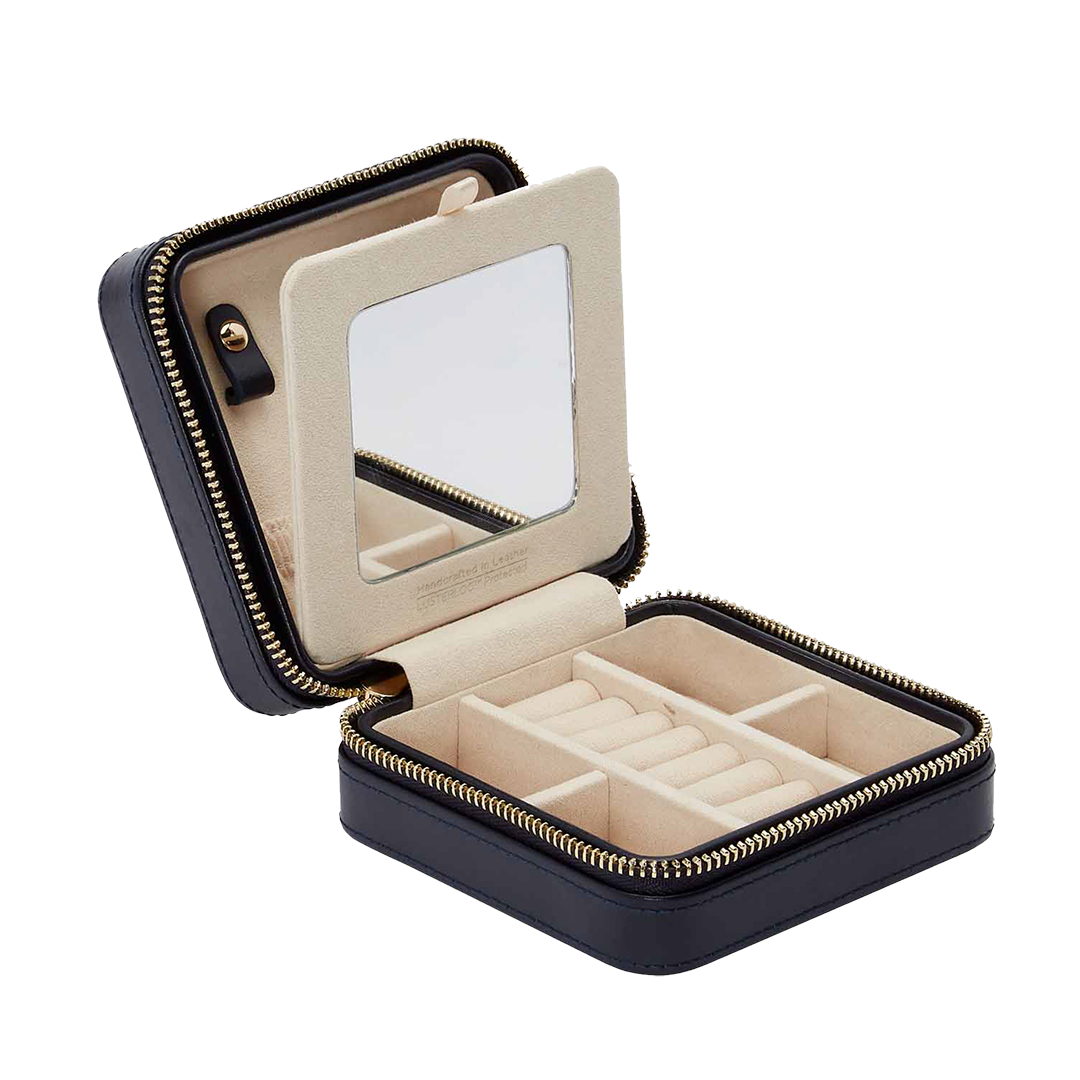 WOLF Jewellery Zip Case Open WOLF jewellery zip case with mirror, cream LusterLoc-lined compartments and gold-finish zip.